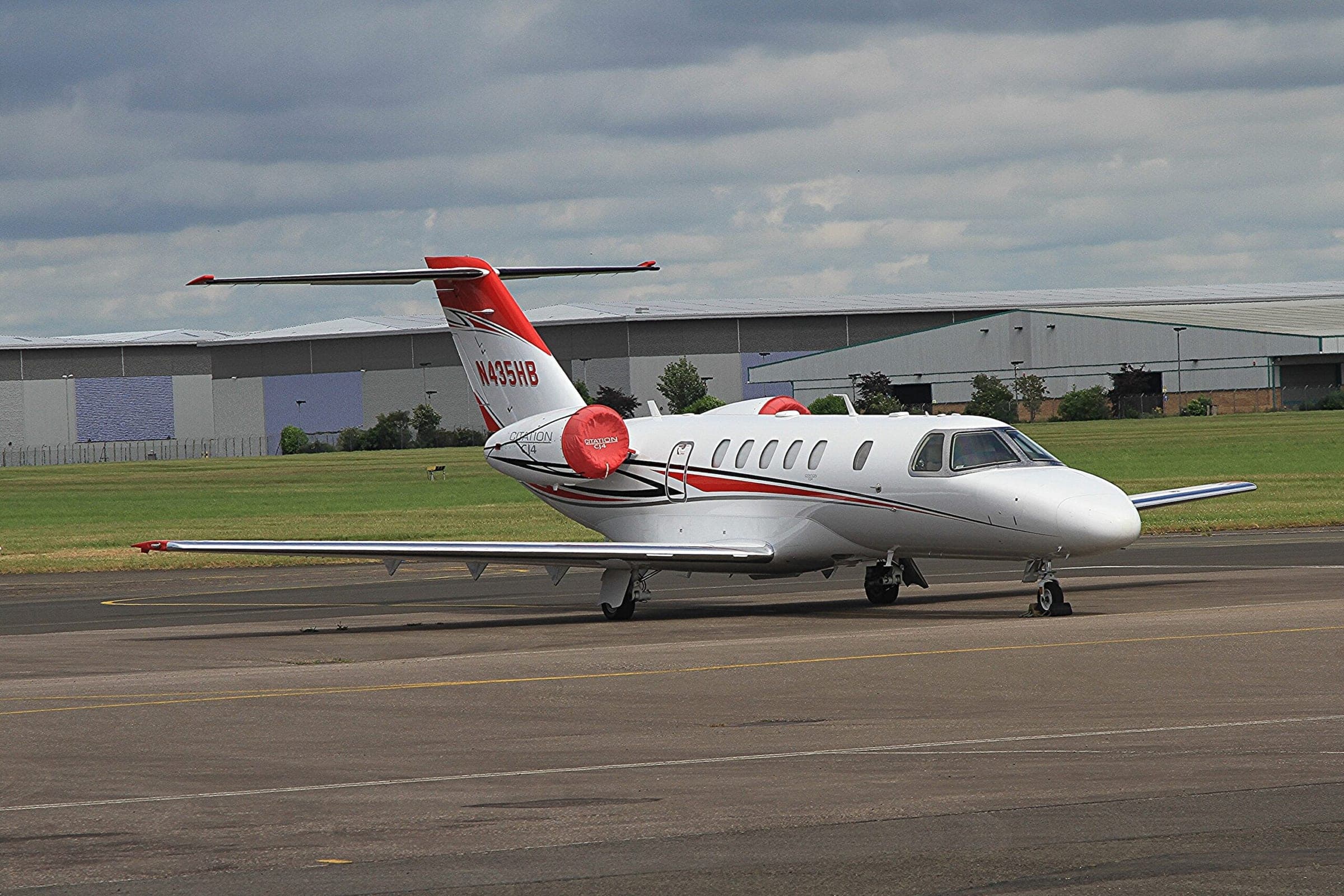 Cessna Citation CJ4 on ground reg number N435HB with engine covers on