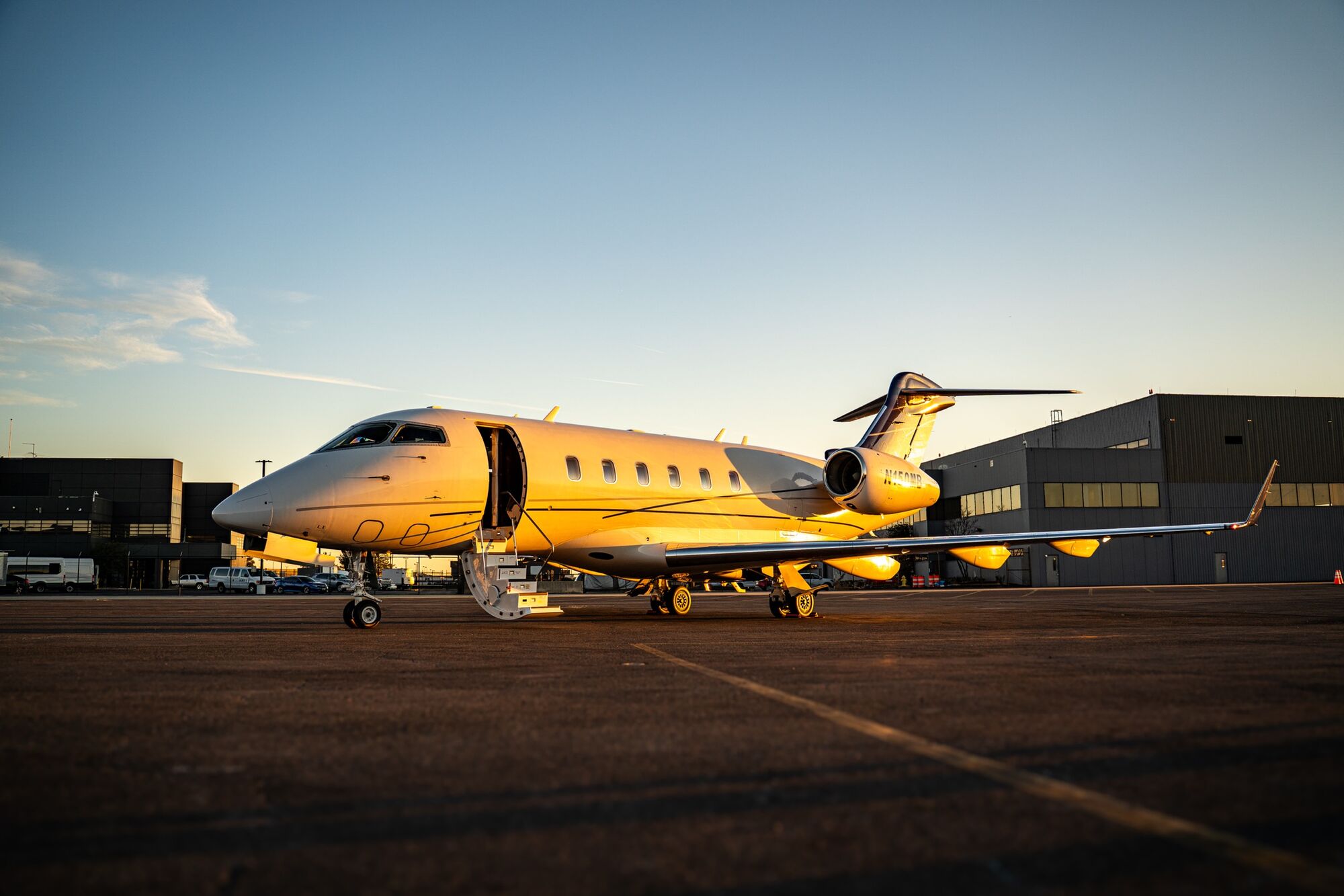CRAFT Challenger 350 N150MB at golden hour outside the hangar