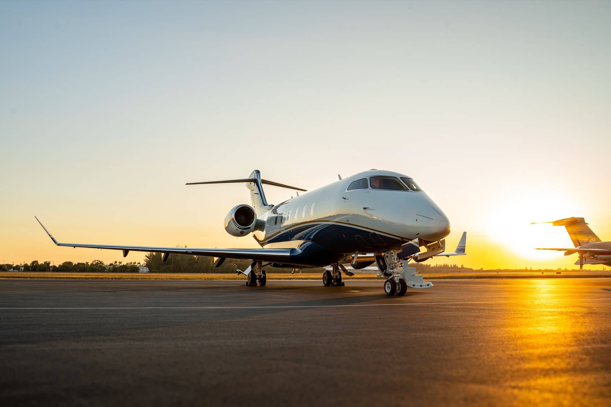 CRAFT Challenger 350 N396PD on the ramp at sunset