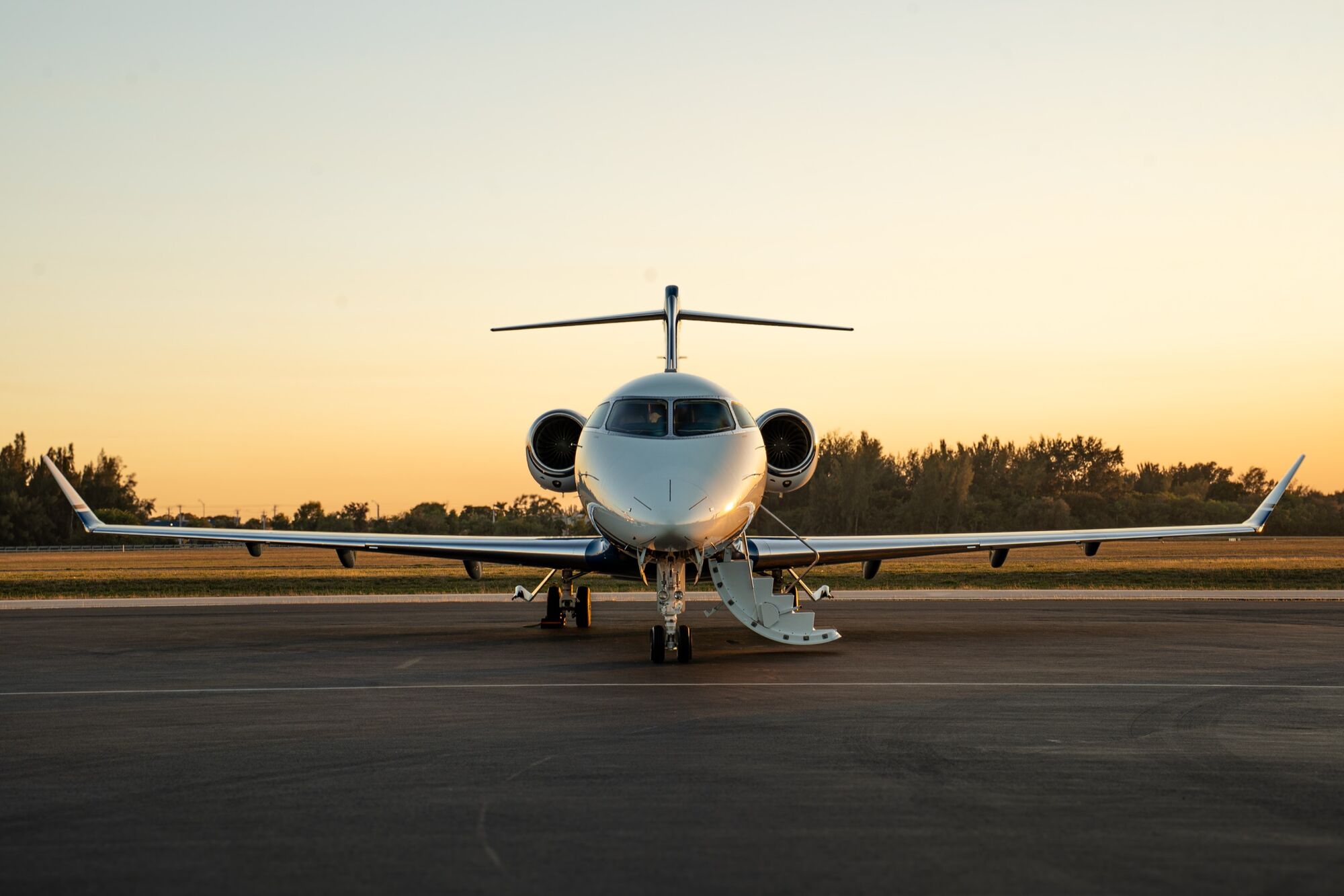 CRAFT Challenger 350 N396PD nose-on at sunset, airstair down
