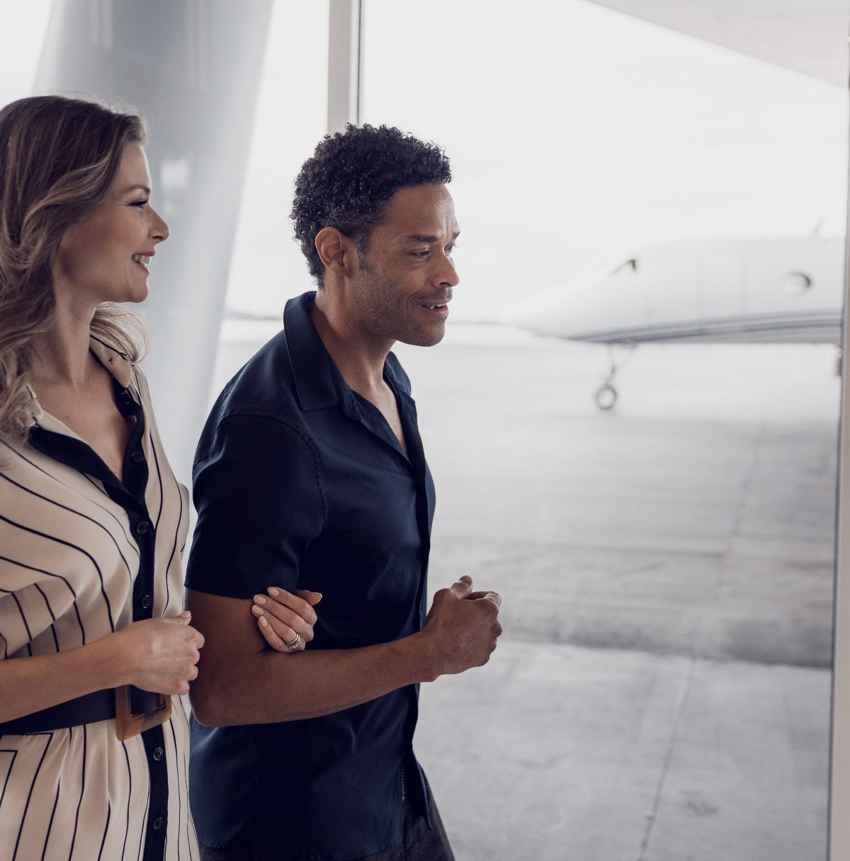 2 people in an airport terminal