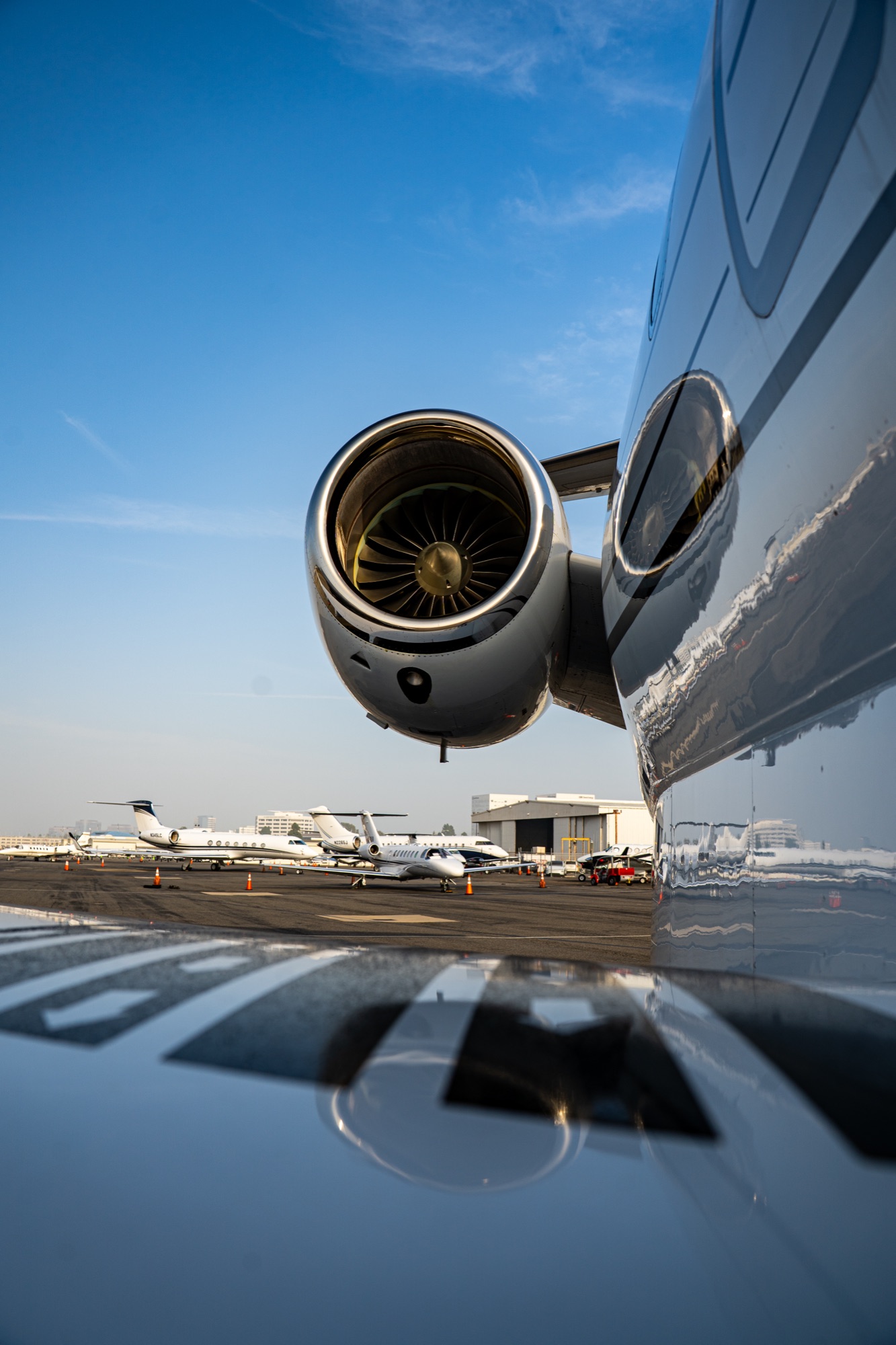 CRAFT Challenger engine detail with the fleet on the ramp behind